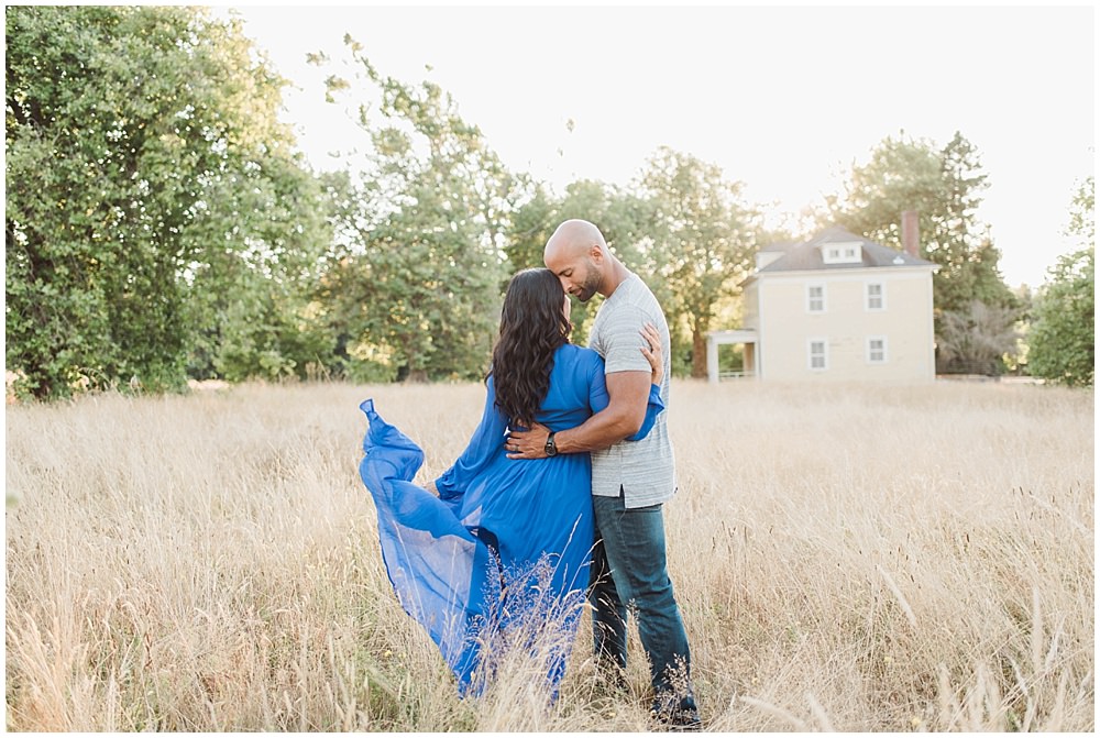  Romantic Discovery Park Seattle engagement photo in long blue lulus dress in the wild fields  | Julianna J Photography | juliannajphotography.com 