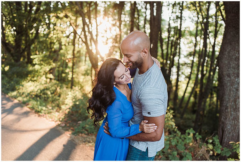  Romantic Discovery Park Seattle engagement photo in long blue lulus dress in the trees  | Julianna J Photography | juliannajphotography.com 